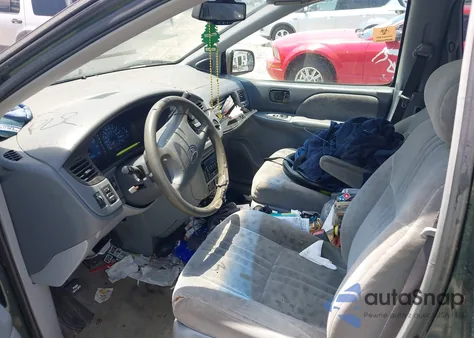 2002 Toyota Sienna Le из США, поврежденный, VIN 4T3ZF13C82U465948